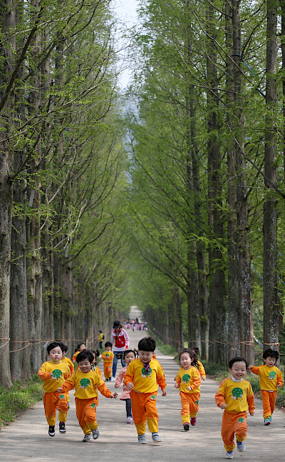 Running children in Naju, South Korea. Photo via Flickr:Republic of Korea