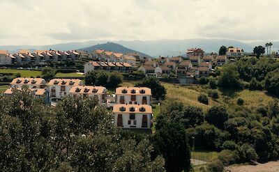 Houses in the hills of San Vicente de la Barquera, Spain. Unsplash:Victor Hugo