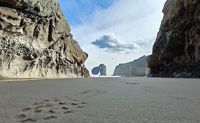 Sandy beach in Llanes, Spain. Unsplash:Des McCarthy