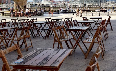 Seating near the statue, Gijón, Spain. Unsplash@Juan Gomez