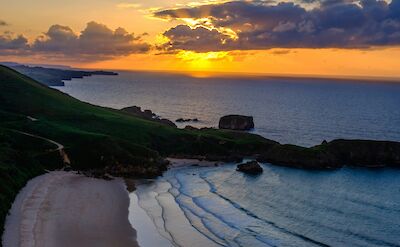 Sunset in Llanes, Spain. Unsplash:Ignacio Fernandez Alvarez