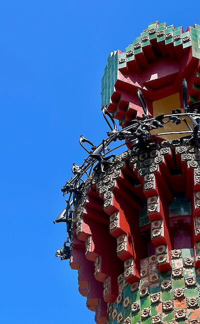 Tower of El Capricho de Gaudi, Comillas, Spain. Unsplash:Iker Puyalto