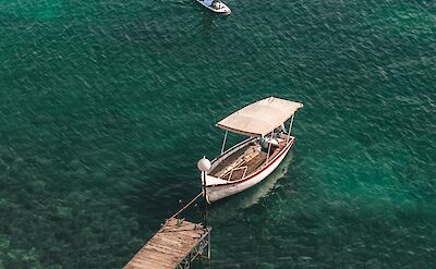 Beautiful Lake Ohrid borders Albania & Macedonia. Unsplash:Atahanguc