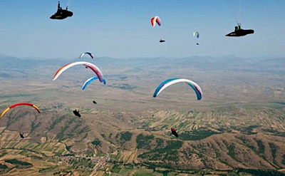 Paragliders soaring in Macedonia.