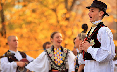 Folk dancing along the Danube River bike tour. ©TO