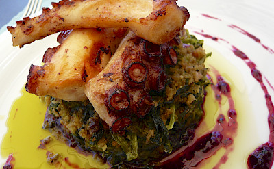 Charred octopus, cornbread and turnip greens in Porto, Portugal. Flickr:Jessica Spengler
