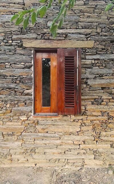 Wooden window in Figueira de Castelo Rodrigo, Portugal. Unsplash@Rui Alves