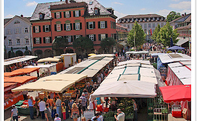 Market in Ludwigsburg, Germany along the Neckar and Mainz Rivers. Photo via Flickr:Jorbasa Fotografie
