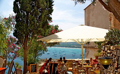 Scenic dining by the port of Calvi, Corsica. Photo via Flickr:philippe amiot