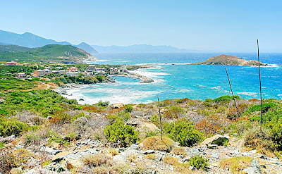 Mountains and blue waters surround Centuri on Corsica, France. Photo via Flickr:antonio erre 