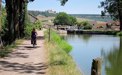 Biking along the river in Burgundy, France.