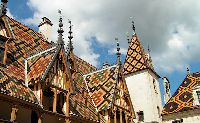 Unique roofs at Hospices de Beaune in Beaune, Burgundy, France. Creative Commons:Olivier Vanpe