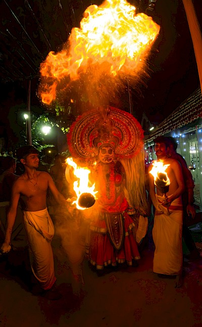 Fire show in Kochi, Kerala bike tour, India. Unsplash@Sleeba Thomas