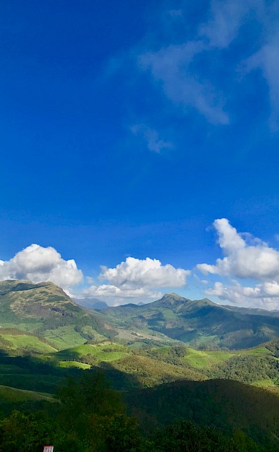 Mountains of Munnar, Kerala bike tour, India. Unsplash@Manas Manikoth