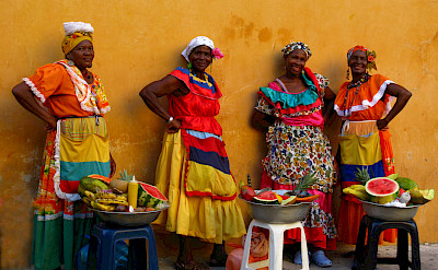 Women selling watermelon in Colombia. Photo via Flickr:Luz Adriana Villa