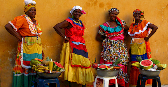 Women selling watermelon in Colombia. Photo via Flickr:Luz Adriana Villa