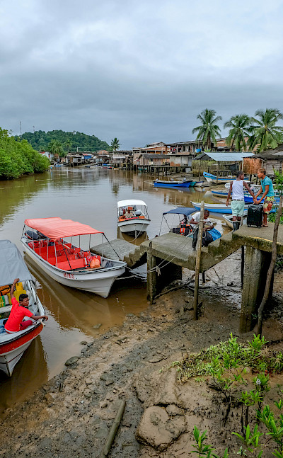 Boats in Nuquí on the Pacific Ocean, Colombia. Photo via Flickr:Serge