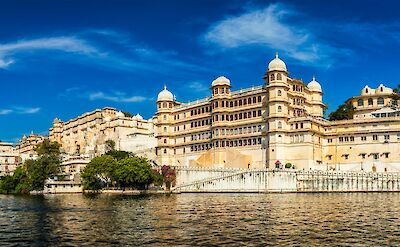 Blue skies above the palaces of Udaipur, India. Unsplash@Getty Images