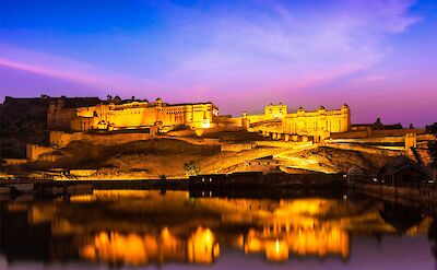 The Amber Fort illuminated at night, Jaipur. Unsplash@Getty Images