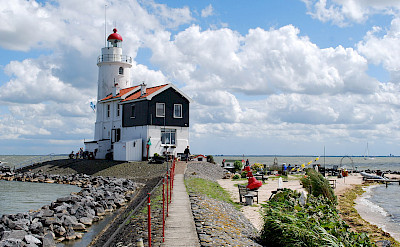 Lighthouse in Marken, North Holland, the Netherlands. Photo via Wikimedia Commons:Rob Koster