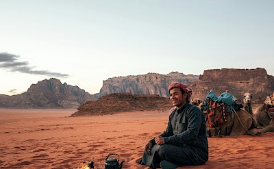 Local man making tea in the Wadi Rum desert, Jordan. Unsplash@Spencer Davis
