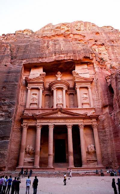 Al-Khazneh, is one of the most elaborate temples in the ancient Arab Nabatean Kingdom city of Petra. As with most of the other buildings in this ancient town, including the Monastery, this structure was carved out of a sandstone rock face.
