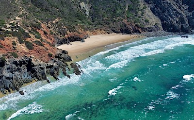 Red and black cliffs at Sagres, Portugal. Unsplash@Leon Rohrwild