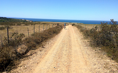 To the beach on the Vicentine Coast & Algarve Bike Tour in Portugal.