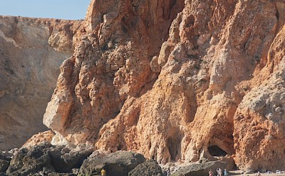 Surfers at Sagres, Portugal. Unsplash@Michael Baccin