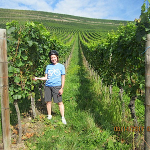 Posing for a picture in vineyard