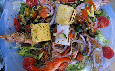Seafood laden Mediterranean lunch in Italy. Photo via Flickr:Karne