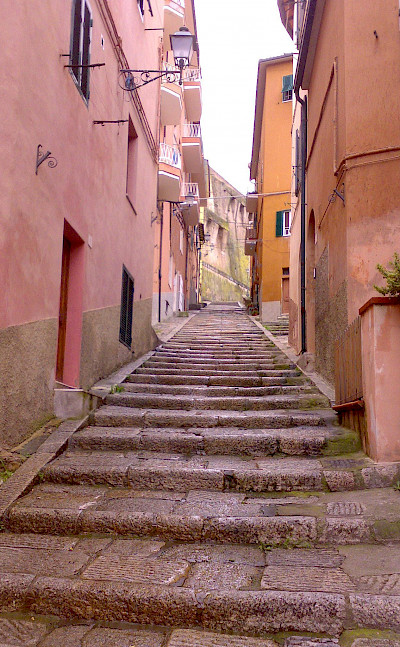 Street in Porto Santo Stefano on the Tuscan Coast, Italy. Photo via Wikimedia Commons:Ceppicone