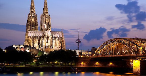 The famous Cathedral & Hohenzollern Bridge in Cologne, Germany. Flickr:Jiuguang Wang