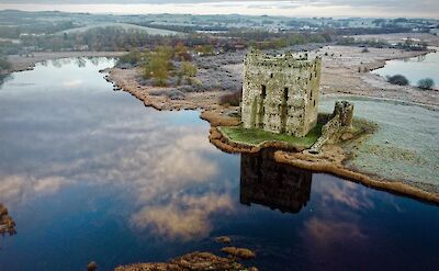 Blue skies reflected at Threave Castle, Scotland. CC:Galloway Cycling Holidays