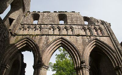 Looking up at Dundrennan Abbey, Scotland. Flickr:Tom Parnell