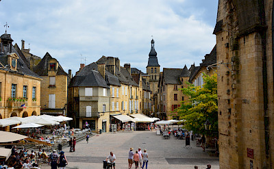 Shopping in a Bastide town in Dordogne, France. Flickr:Lynn Rainard