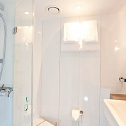 All the comforts of home in private bathrooms on board the Arkona | Bike & Boat Tours