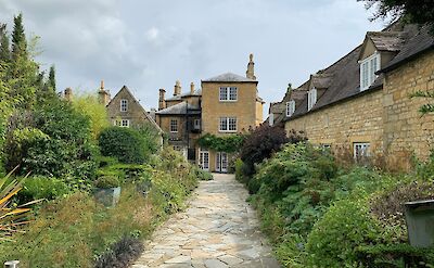 Pathway through a garden, Chipping Campden, England. Unsplash:Becky Fantham