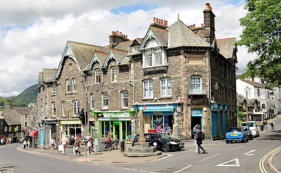 Shopping in Ambleside, Cumbria in the Lakes District, England. Photo via Wikmedia Commons:Nilfanion