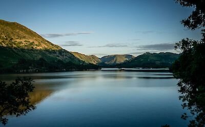 Clouds above Ullswater Lake, Lake District, England. Unsplash:James Armes