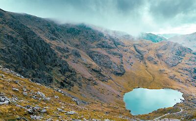 Mist over Coniston Lake, Lake District, England. Unsplash:Jake Colling