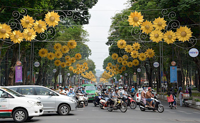 Bustling traffic in Ho Chi Minh City, Vietnam. Photo via Flickr:Paul Arps