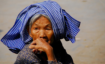 Old woman wearing the traditional <i>krama</i> headdress in Kampong Thom, Vietnam. Flickr:BMR & MAM