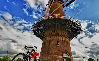 Bicycles and windmills in Rotterdam, South Holland, the Netherlands. Flickr:Luca Bolatti Guzzo