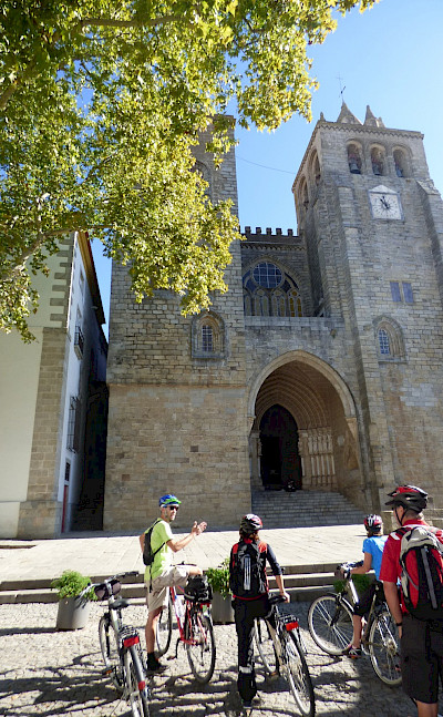 Bike rest to admire Sé de Évora in Alentejo, Portugal. 