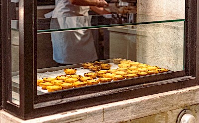 Bakery selling pasteis de nata, Portugal. Unsplash@Beth Chobanova