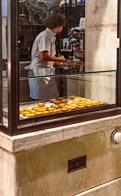 Bakery selling pasteis de nata, Portugal. Unsplash@Beth Chobanova