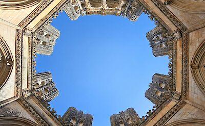 Looking up at the sky from inside the Monastery of Batalha, Portugal. Unsplash@Hasmik Ghazaryan Olson