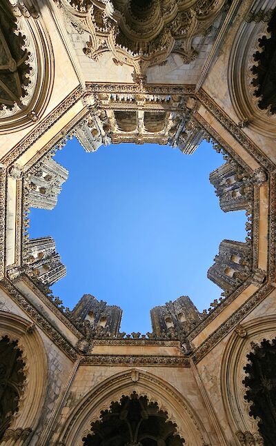 Looking up at the sky from inside the Monastery of Batalha, Portugal. Unsplash@Hasmik Ghazaryan Olson