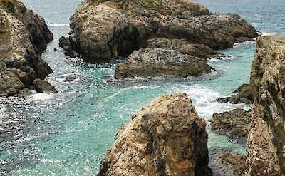 Rocky outcrops at Porto Covo, Portugal. Unsplash@Winged Jedi